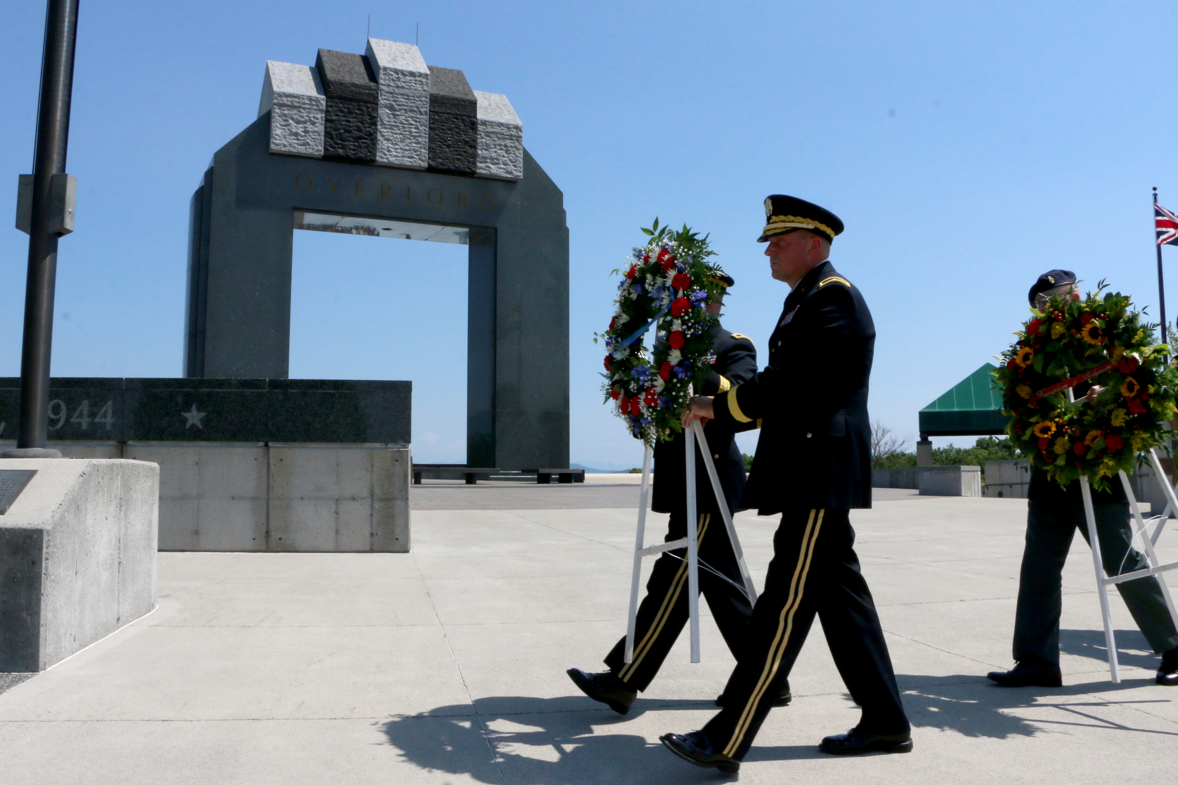 Senior Virginia National Guard leaders present a wreath honoring the United States of America along with other Allied countries who took part in the D-D-Day invasion at the observance of the 71st anniversary of the Allied invasion of Normandy, France, June 6, 2015, at the National D-Day Memorial in Bedford, Virginia.